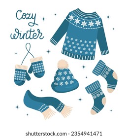 Christmas set of clothes, sweater, socks, hat, scarf and mittens. Blue design with snowflakes. Illustration, vector	
