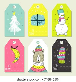 Christmas set of gift labels and tags with illustrations of cute winter decoration. Vector winter symbols.