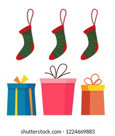 Christmas set wit decorative winter objects - gift boxes, socks isolated on white background. Flat cartoon style vector illustration.