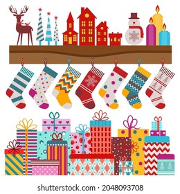 Christmas shelf with gift socks and decorations. Candles, holiday trees and wrapped gifts in colourful paper. Xmas and New year elements set with hanging festive stocking and wrapped gift boxes.