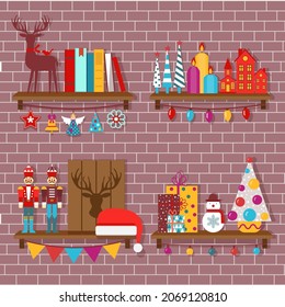 Christmas shelves with festive decorations, toys, books, gifts and garlands. Shelf decor with Xmas tree, reindeer, candles and house candle holder lanterns, Santa Claus hat, tin soldiers and snowman.