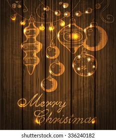 Christmas shining decorations on a wooden background