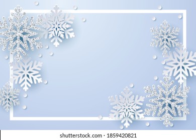 Christmas shiny silver glitter and white paper snowflake on soft blue background.Origami snow fall vector with copy space for text.