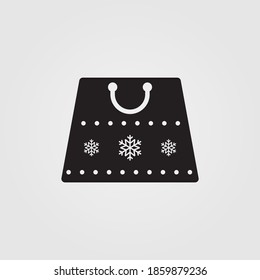 Christmas shopping bag icon. Perfect shopping bag symbol for winter sale discounts concept.