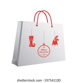 Christmas shopping bag with a printed pattern of red pendants: stocking, bell with holly leaves and berries, a ball with a congratulatory inscription. Vector illustration.
