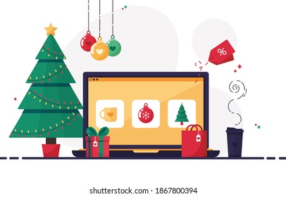 Christmas shopping online through a laptop. Ordering gifts at home. Preparing presents for the holidays, Christmas, xmas and New Year. Sale in the e store. Colorful