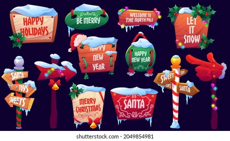 Christmas signboards, wooden signs with snow, santa hat, garlands and bells with holly leaves. Wood banners, road direction arrows on striped poles, holiday billboards Cartoon vector illustration set