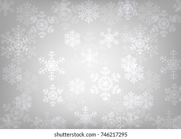 Christmas silver background with glowing snowflakes and bokeh