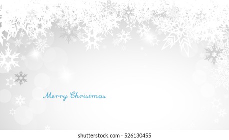 Christmas silver background with snowflakes and decent blue Merry Christmas text - horizontal version