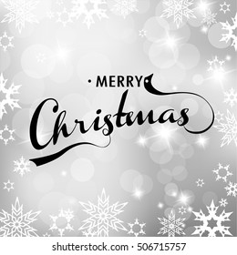 Christmas silver background with snowflakes and Merry Christmas text. 