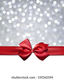 Christmas silver bokeh background with red bow. Vector eps10.