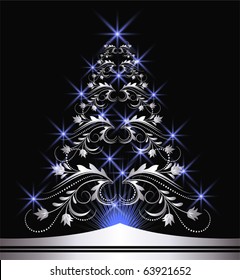Christmas silver fur-tree with blue stars