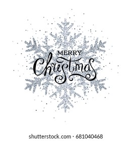 Christmas silver snowflake with a holiday wishes, drawn in the ornamental way. Decoration element with lettering text for greeting cards or banners.