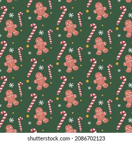 
Christmas simple seamless pattern illustration. Victor icon different candy cane, gingerbread green background. Christmas design for wrapping paper, textile, greeting cards backgrounds, etc.