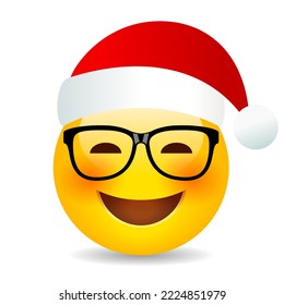 Christmas smiling emoji with red Santa cap, vector cartoon isolated on white background