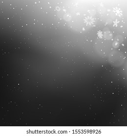 Christmas snow clouds backdrop with light in corner dark and falling snows. Winter holiday bokeh background. Big and small snowflakes falling from night black sky