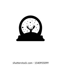 Christmas snow globe with deer silhouette