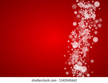 Christmas snow on red background. Santa Claus colors. Horizontal frame for winter banner, gift coupon, voucher, ad, party event. New Year and Christmas snow design. Falling snowflakes for celebration