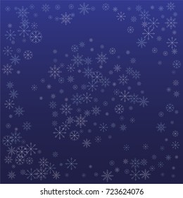 Christmas snow powder background of a random scatter snowflakes on a blue background. Snow explosion. Ice storm.