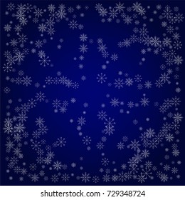 Christmas snow powder background of a random scatter snowflakes in blue. Snow explosion. Ice storm.