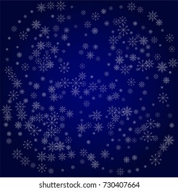 Christmas snow powder background of a random scatter snowflakes in blue. Snow explosion. Ice storm.