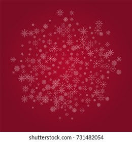 Christmas snow powder background of a random scatter snowflakes on a red background. Snow explosion. Ice storm.
