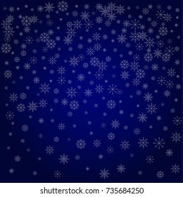 Christmas snow powder background of a random scatter snowflakes in blue. Snow explosion. Ice storm.