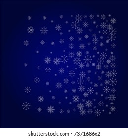 Christmas snow powder background of a random scatter snowflakes in blue. Snow explosion. Ice storm.