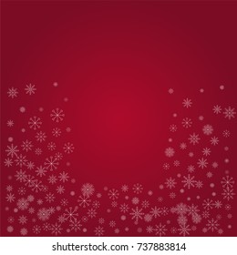 Christmas snow powder background of a random scatter snowflakes on a red background. Snow explosion. Ice storm.