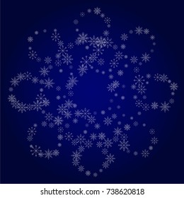 Christmas snow powder background of a random scatter snowflakes in blue. Snow explosion. Ice storm.