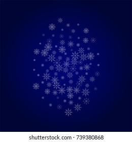 Christmas snow powder background of a random scatter snowflakes in blue. Snow explosion. Ice storm.