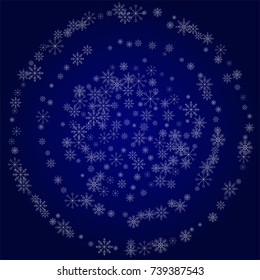 Christmas snow powder background of a random scatter snowflakes in blue. Snow explosion. Ice storm.