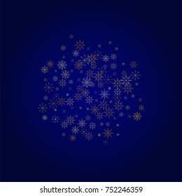 Christmas snow powder background of a random scatter snowflakes in blue. Snow explosion. Ice storm.