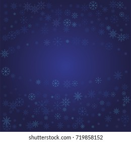 Christmas snow powder frame or border of a random scatter snowflakes on a blue background. Snow explosion. Ice storm.