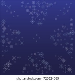 Christmas snow powder frame or border of a random scatter snowflakes on a blue background. Snow explosion. Ice storm.