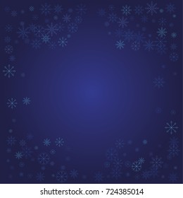 Christmas snow powder frame or border of a random scatter snowflakes on a blue background. Snow explosion. Ice storm.