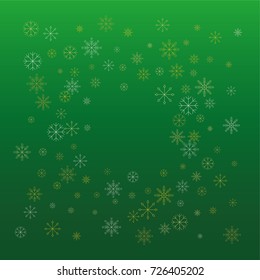 Christmas snow powder frame or border of a random scatter snowflakes on a green background. Snow explosion. Ice storm.