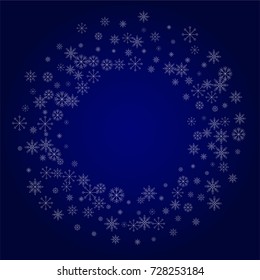 Christmas snow powder frame or border of a random scatter snowflakes in blue. Snow explosion. Ice storm.
