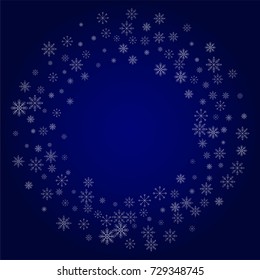 Christmas snow powder frame or border of a random scatter snowflakes in blue. Snow explosion. Ice storm.