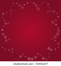 Christmas snow powder frame or border of a random scatter snowflakes on a red background. Snow explosion. Ice storm.