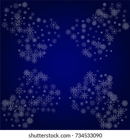 Christmas snow powder frame or border of a random scatter snowflakes in blue. Snow explosion. Ice storm.