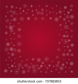 Christmas snow powder frame or border of a random scatter snowflakes on a red background. Snow explosion. Ice storm.
