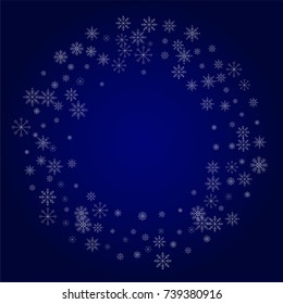 Christmas snow powder frame or border of a random scatter snowflakes in blue. Snow explosion. Ice storm.