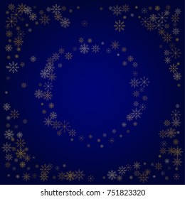 Christmas snow powder frame or border of a random scatter snowflakes in blue. Snow explosion. Ice storm.