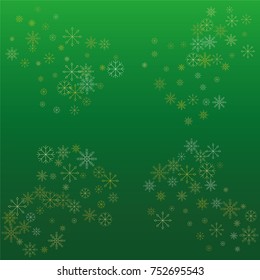 Christmas snow powder frame or border of a random scatter snowflakes on a green background. Snow explosion. Ice storm.