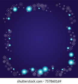 Christmas snow powder frame or border of a random scatter snowflakes on an indigo background. Snow explosion. Ice storm.