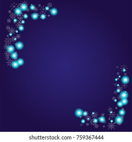 Christmas snow powder frame or border of a random scatter snowflakes on an indigo background. Snow explosion. Ice storm.