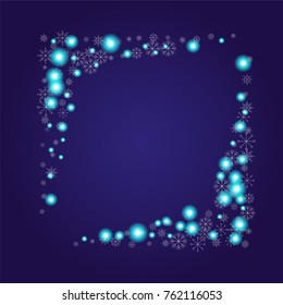 Christmas snow powder frame or border of a random scatter snowflakes on an indigo background. Snow explosion. Ice storm.