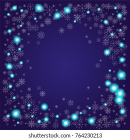 Christmas snow powder frame or border of a random scatter snowflakes on an indigo background. Snow explosion. Ice storm.
