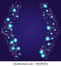 Christmas snow powder frame or border of a random scatter snowflakes on an indigo background. Snow explosion. Ice storm.